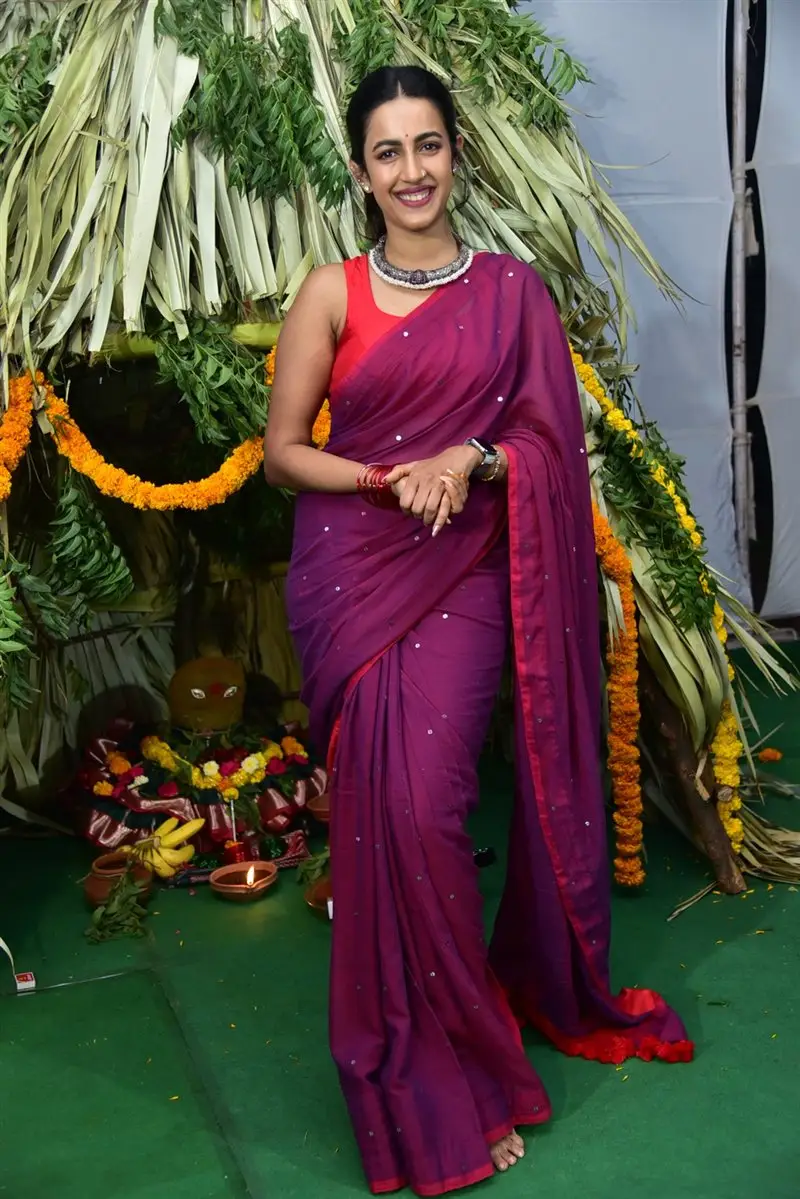 Niharika Konidela Stills in Violet Saree Sleeveless Orange Blouse